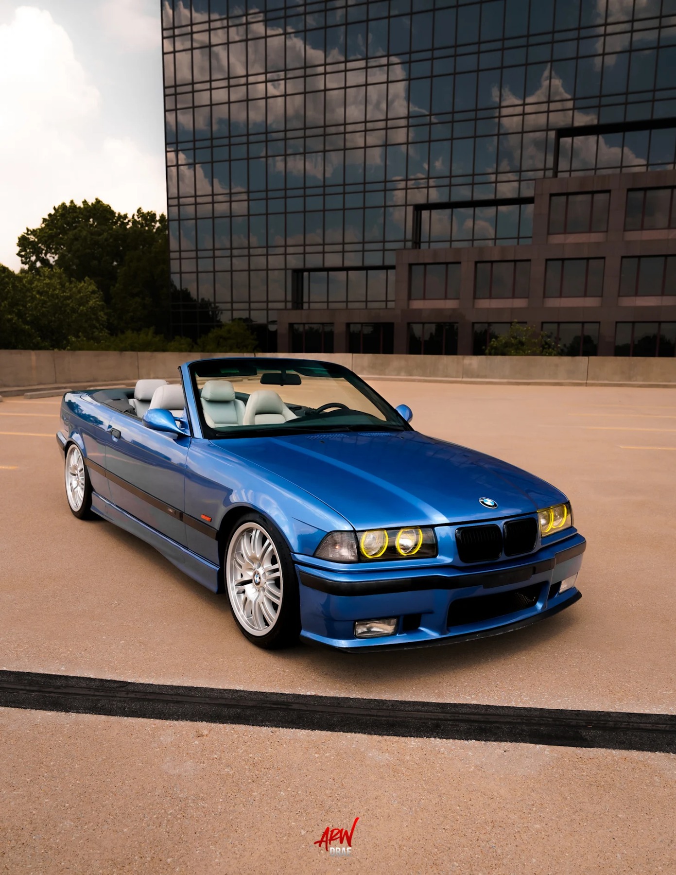 Blue E36 M3 convertible outdoors