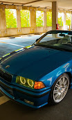 Front three-quarter view of the blue E36 M3