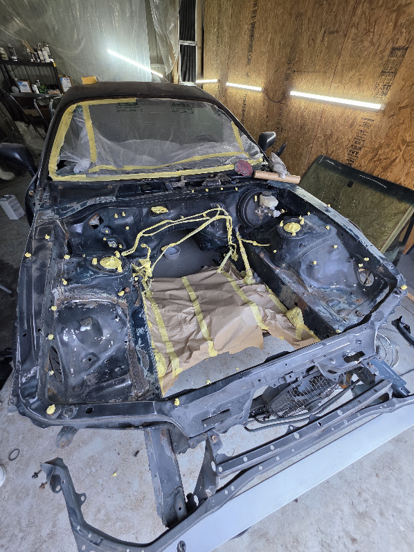 Engine bay sanded and masked for paint