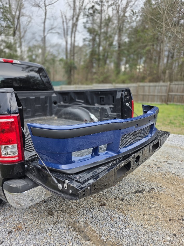 Blue E36 bumper outdoors