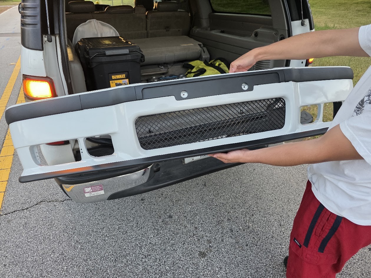 White E36 bumper with black trim and mesh