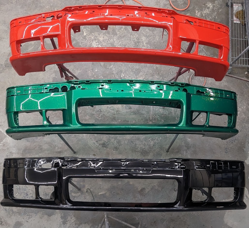 Red, green, and black bumper finishes