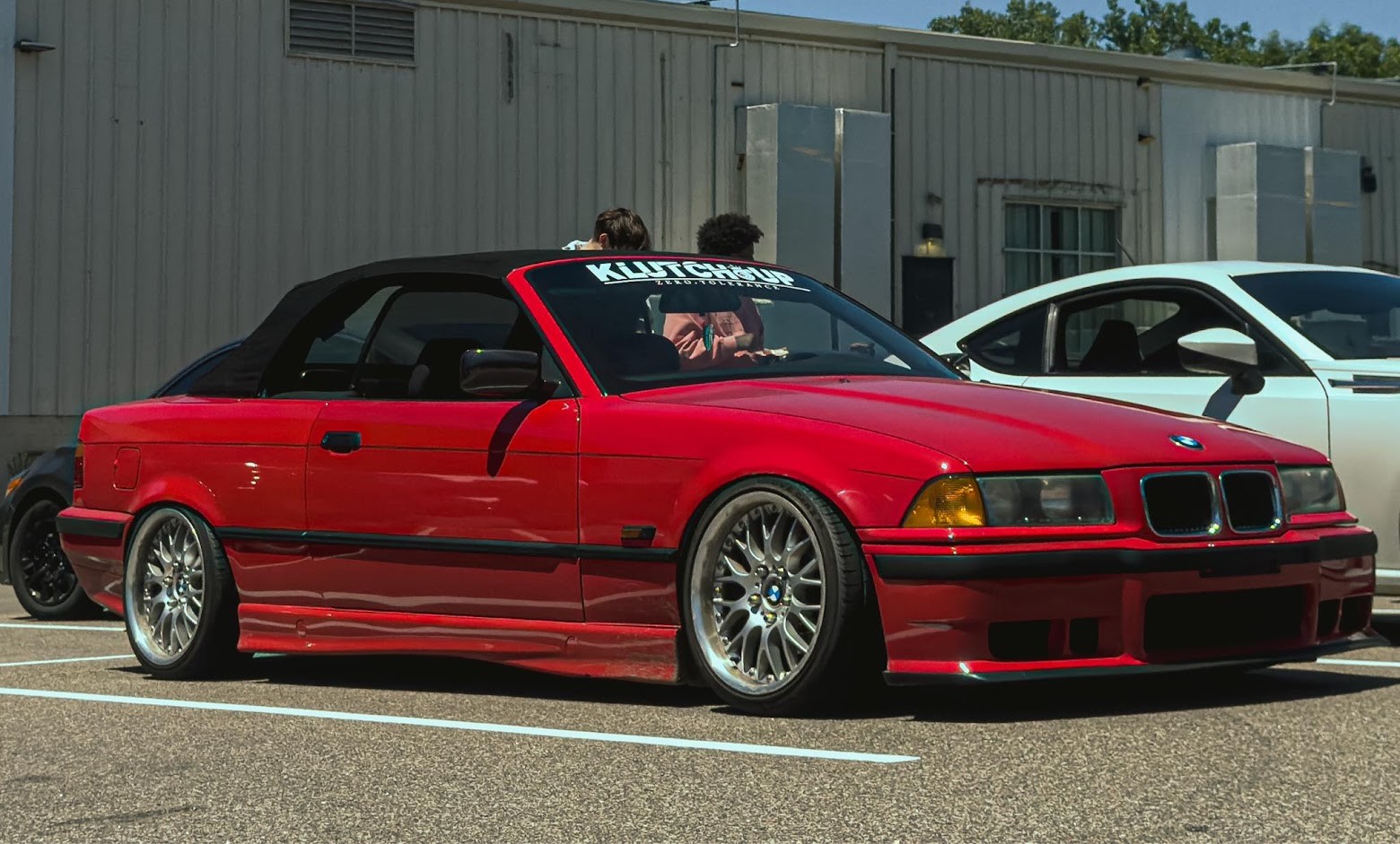 Red E36 with its bumper fitted
