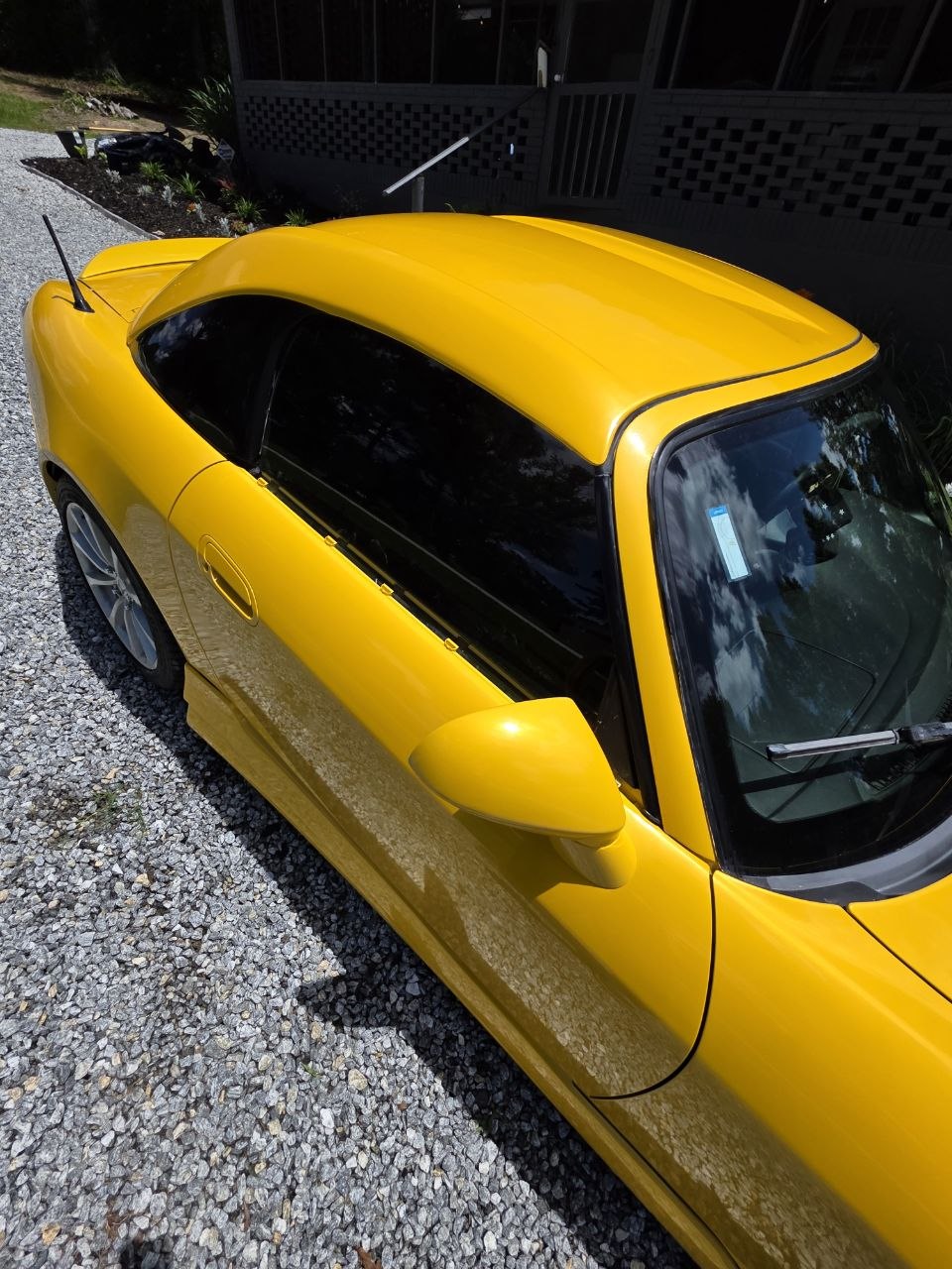 Hardtop, mirror, and upper bodywork detail