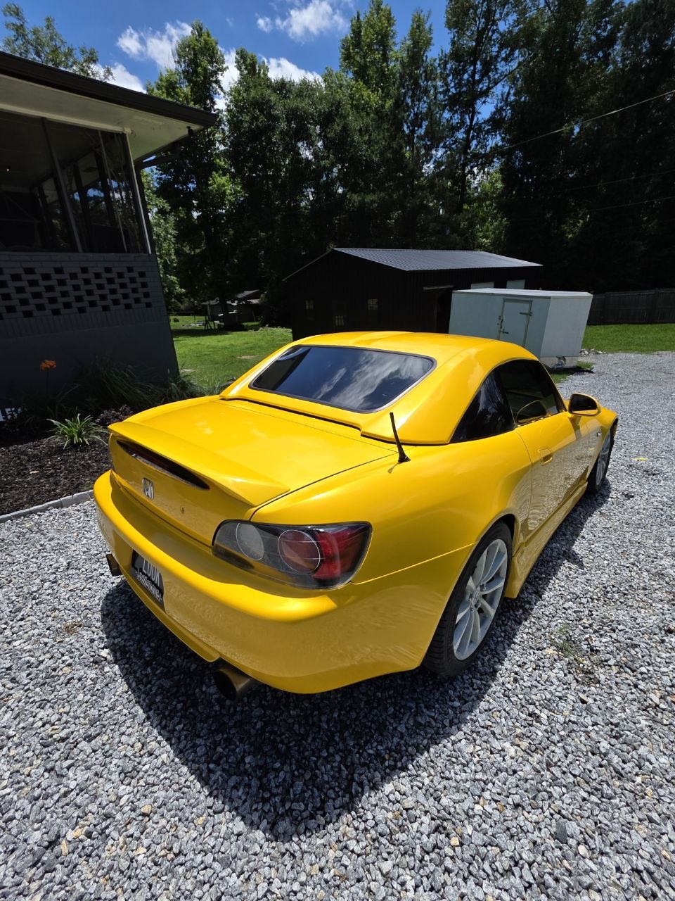 Rear three-quarter view of the yellow finish